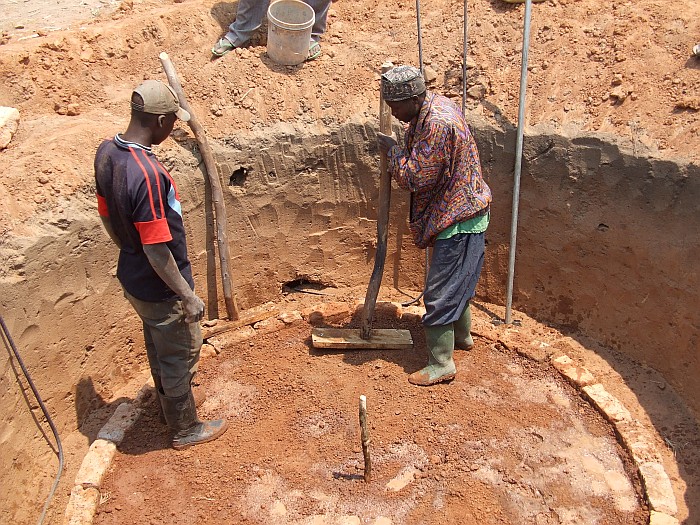 Constructing a water tank to collect rain water from the roof of the health centre.